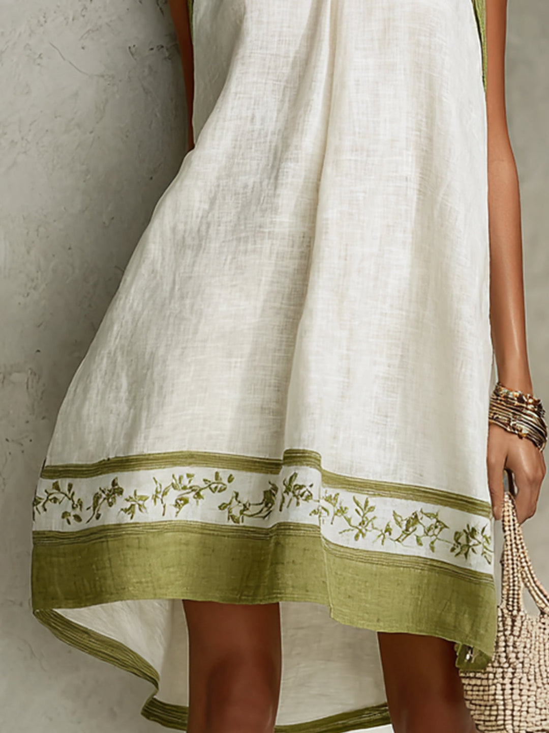 Agathe | Sleeveless A-Line Mini Dress in White and Olive Green Floral Print