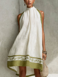 Agathe | Sleeveless A-Line Mini Dress in White and Olive Green Floral Print